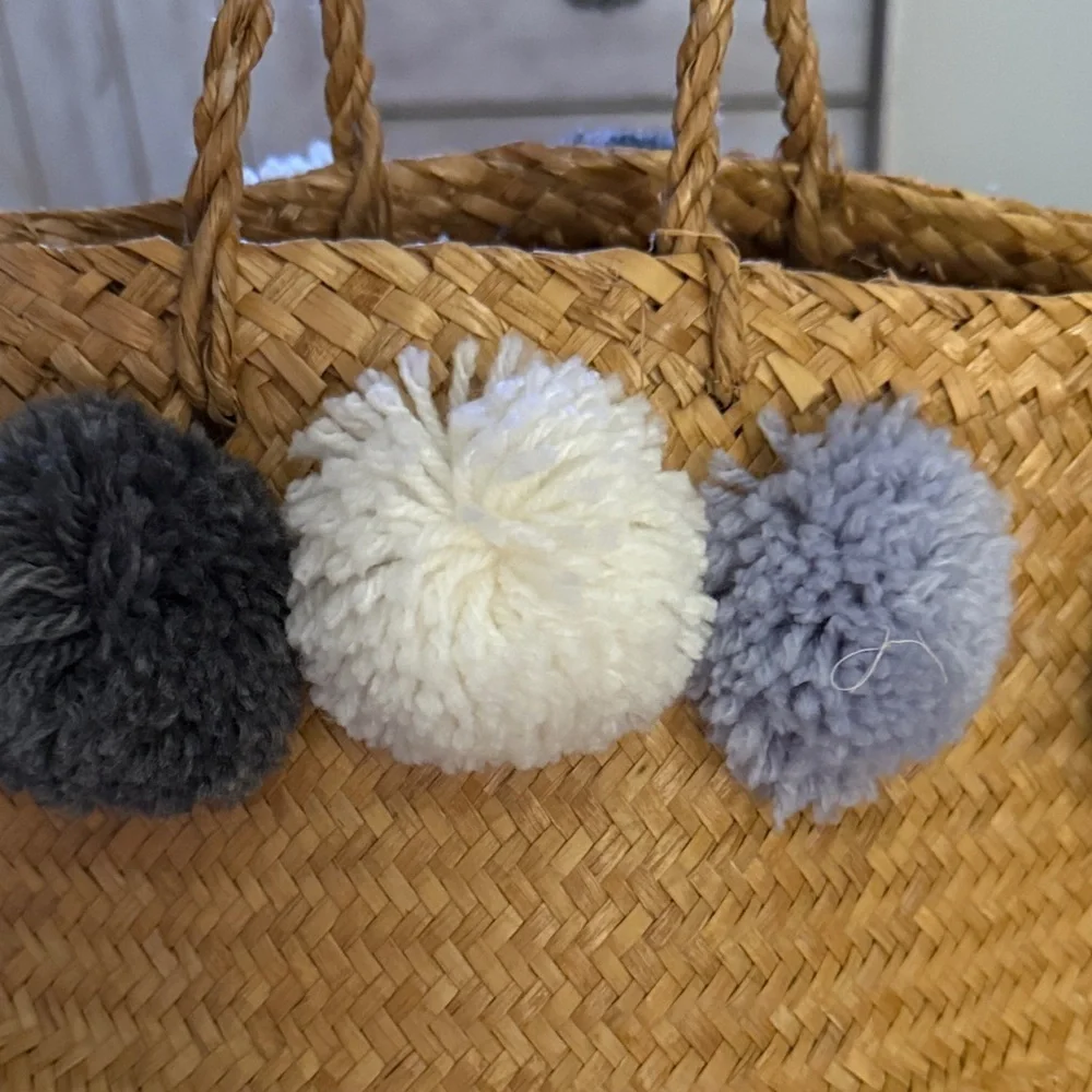 Handcrafted Basket with Pom Pom Accents